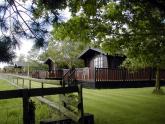 Read more about the article Puddock Farm Pine Lodges – Lodge in Brookland